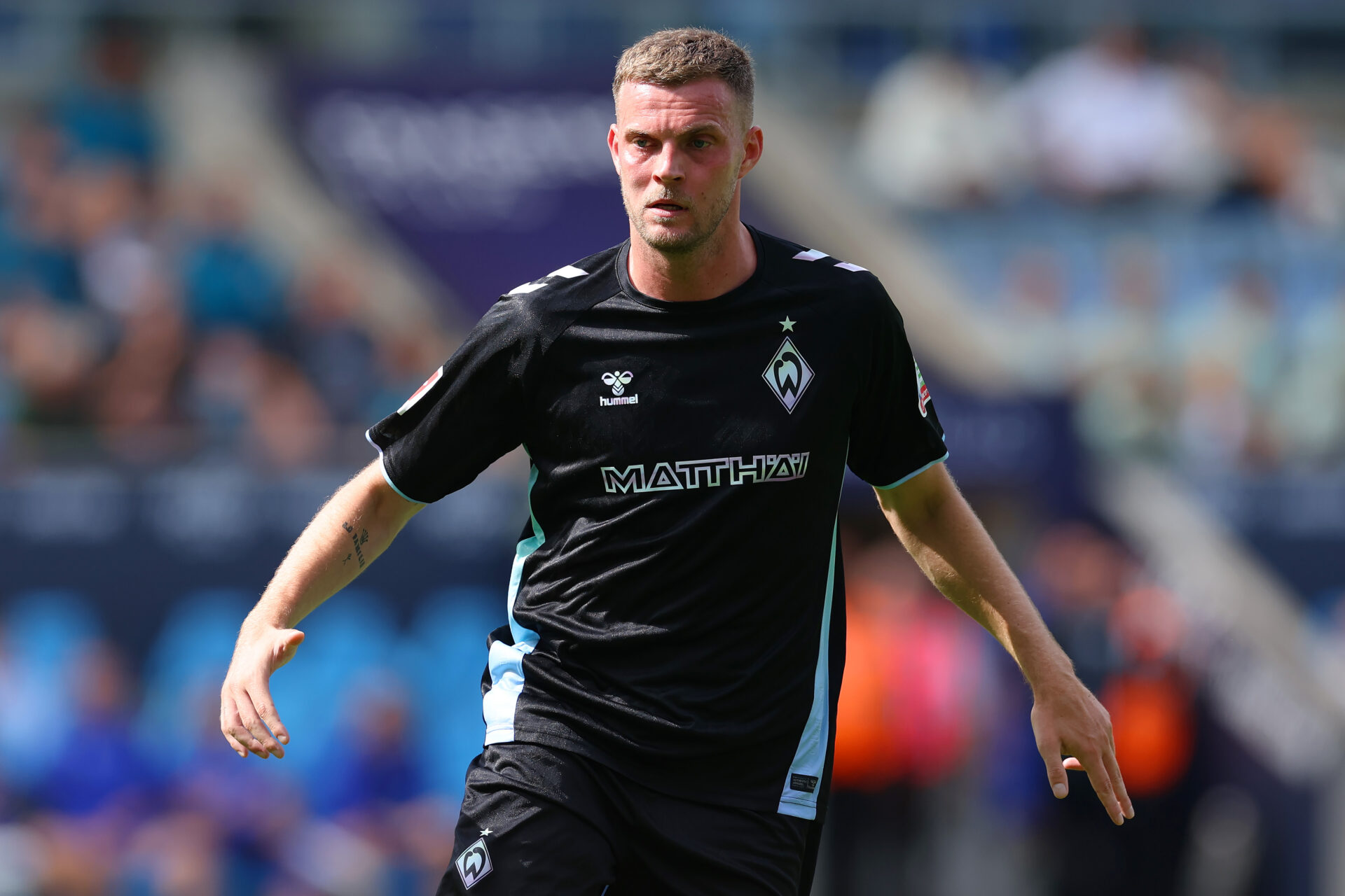 Marvin Ducksch of Werder Bremen runs during the pre-season friendly match between Coventry City and Werder Bremen at The Coventry Building Society Arena on August 03, 2024 in Coventry, England.